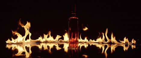 Whisky-Bottle-and-Fire-Background-01